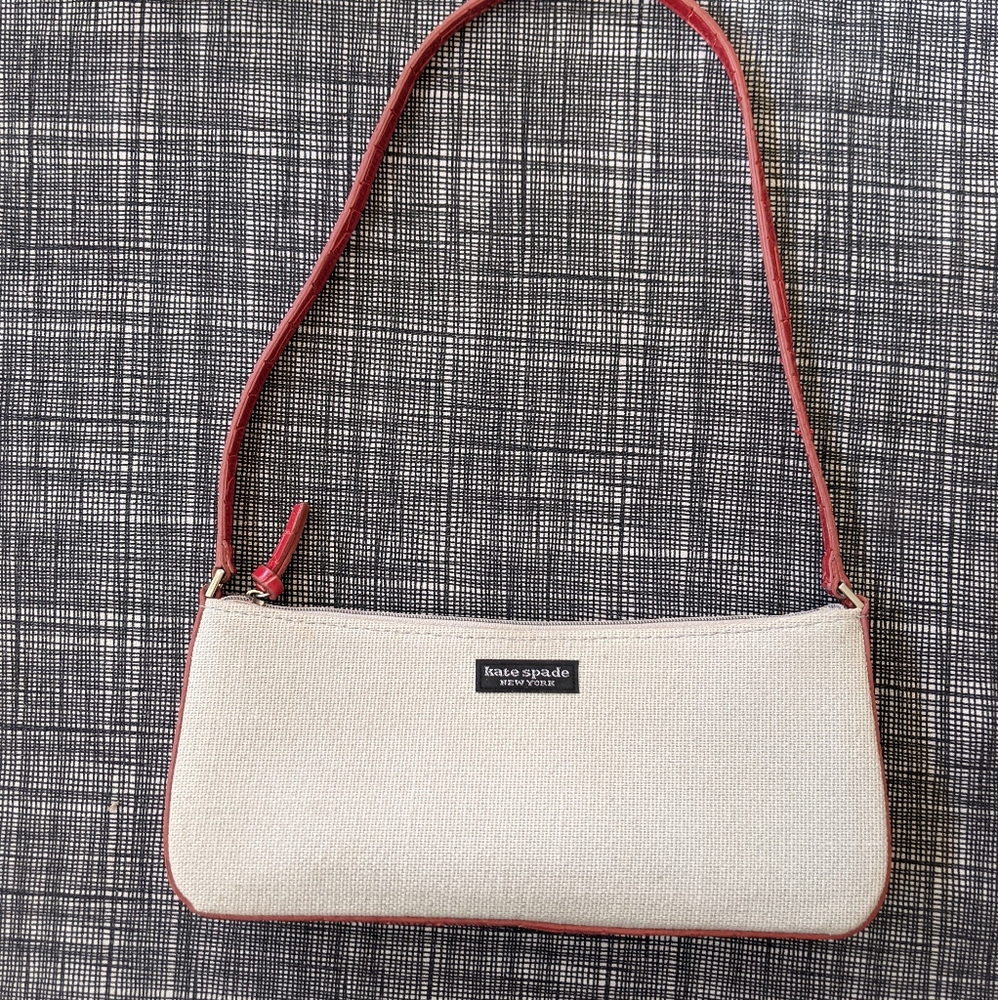 Kate Spade clutch with red patent leather trim